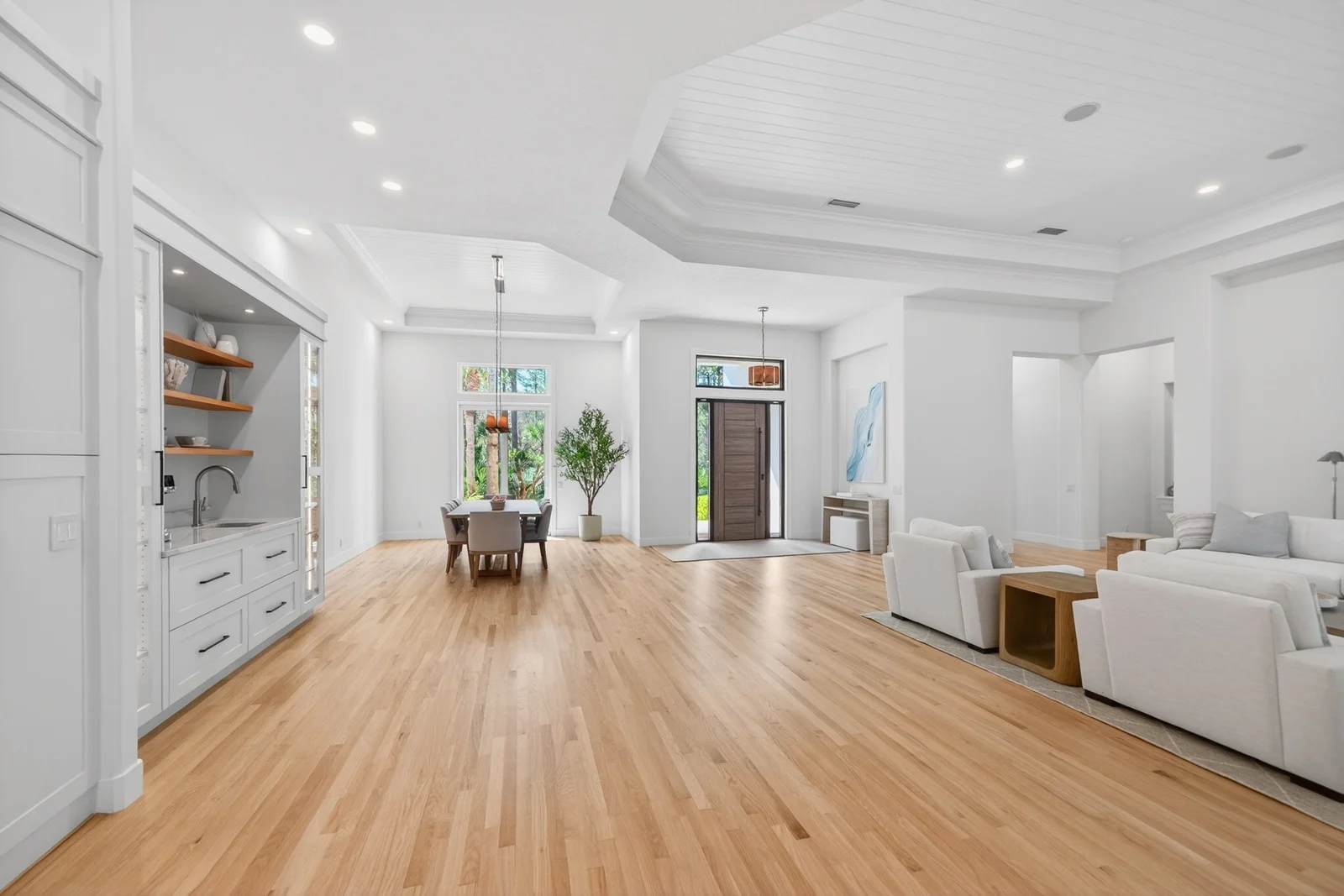 Gallery 12 Great room with shiplap tray ceiling and entry view in Venice remodel