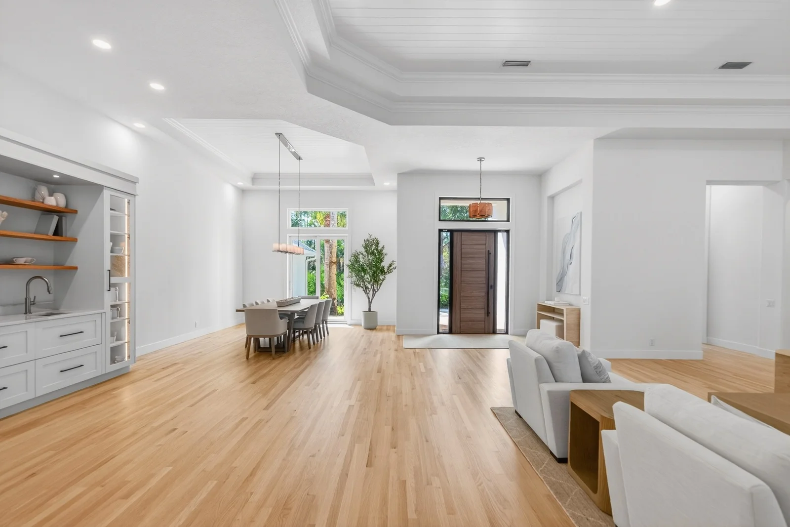 Gallery 11 Open floor plan great room with white oak floors in Venice home remodel